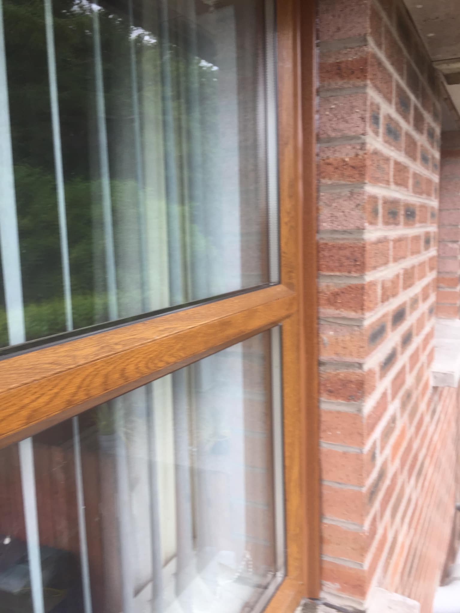 Brown wooden look pvc window frame